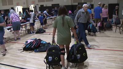 A Forsyth County church is giving more than 1,000 backpacks filled with supplies to local schools