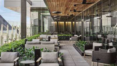 New lounge at Hartsfield Jackson features outdoor seating, showers and whiskey bar