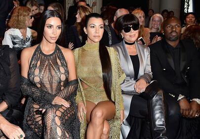 PARIS, FRANCE - SEPTEMBER 29: Kim Kardashian, Kourtney Kardashian, Kris Jenner and Corey Gamble attend the Balmain show as part of the Paris Fashion Week Womenswear Spring/Summer 2017 on September 29, 2016 in Paris, France. (Photo by Pascal Le Segretain/Getty Images)
