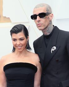 HOLLYWOOD, CALIFORNIA - MARCH 27: Kourtney Kardashian and Travis Barker attend the 94th Annual Academy Awards at Hollywood and Highland on March 27, 2022 in Hollywood, California. (Photo by David Livingston/Getty Images)